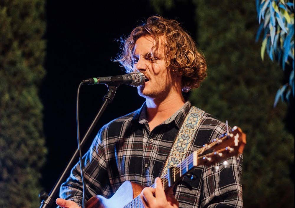 Evan Honer performing live on stage